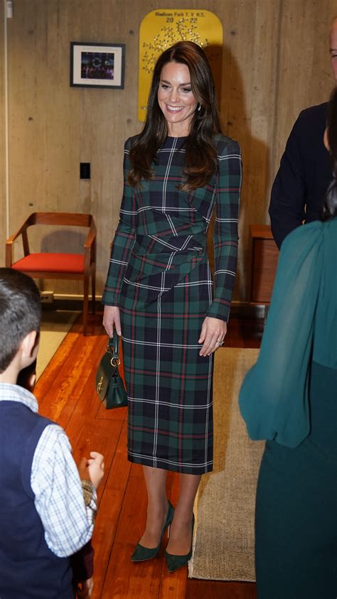 Kate Middleton Greets Boston in a Tartan Dress .